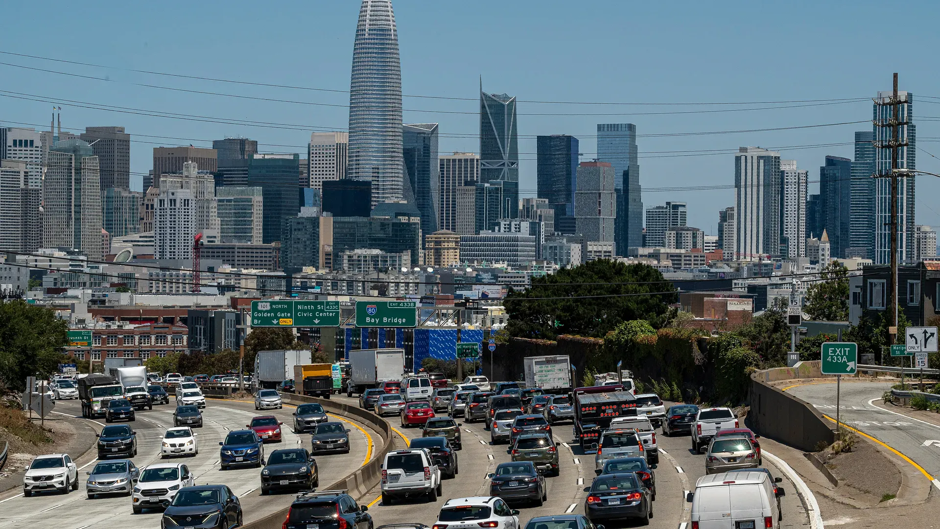 San Francisco skyline with Salesforce Tower and I-80 Bay Bridge freeway traffic in the foreground